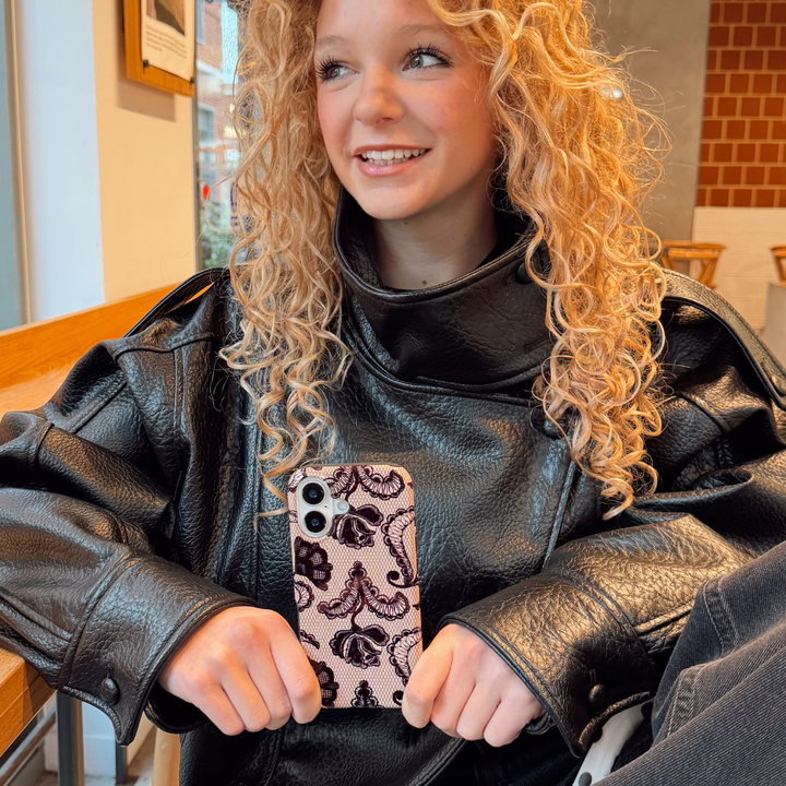 Girl smiling posing with the black lace tough phone case