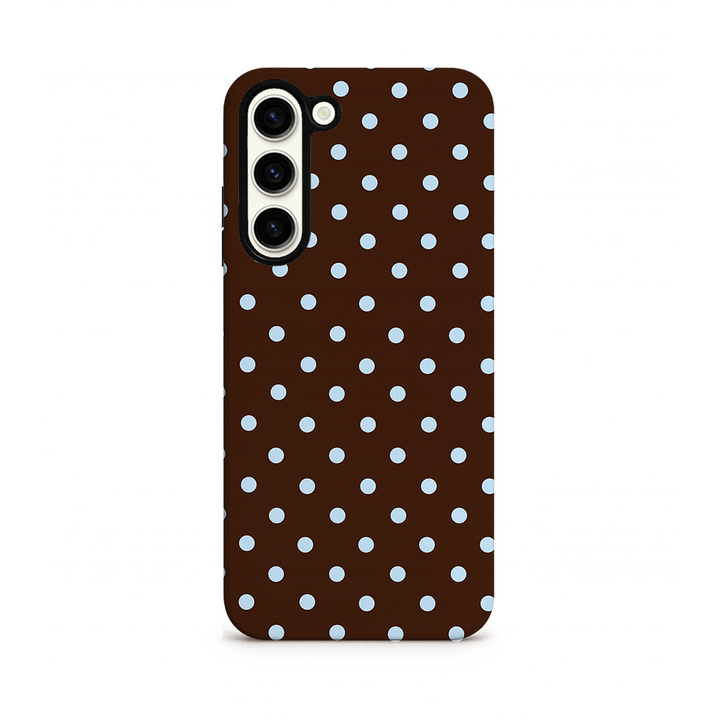 Phone case with white polka dots on a brown background