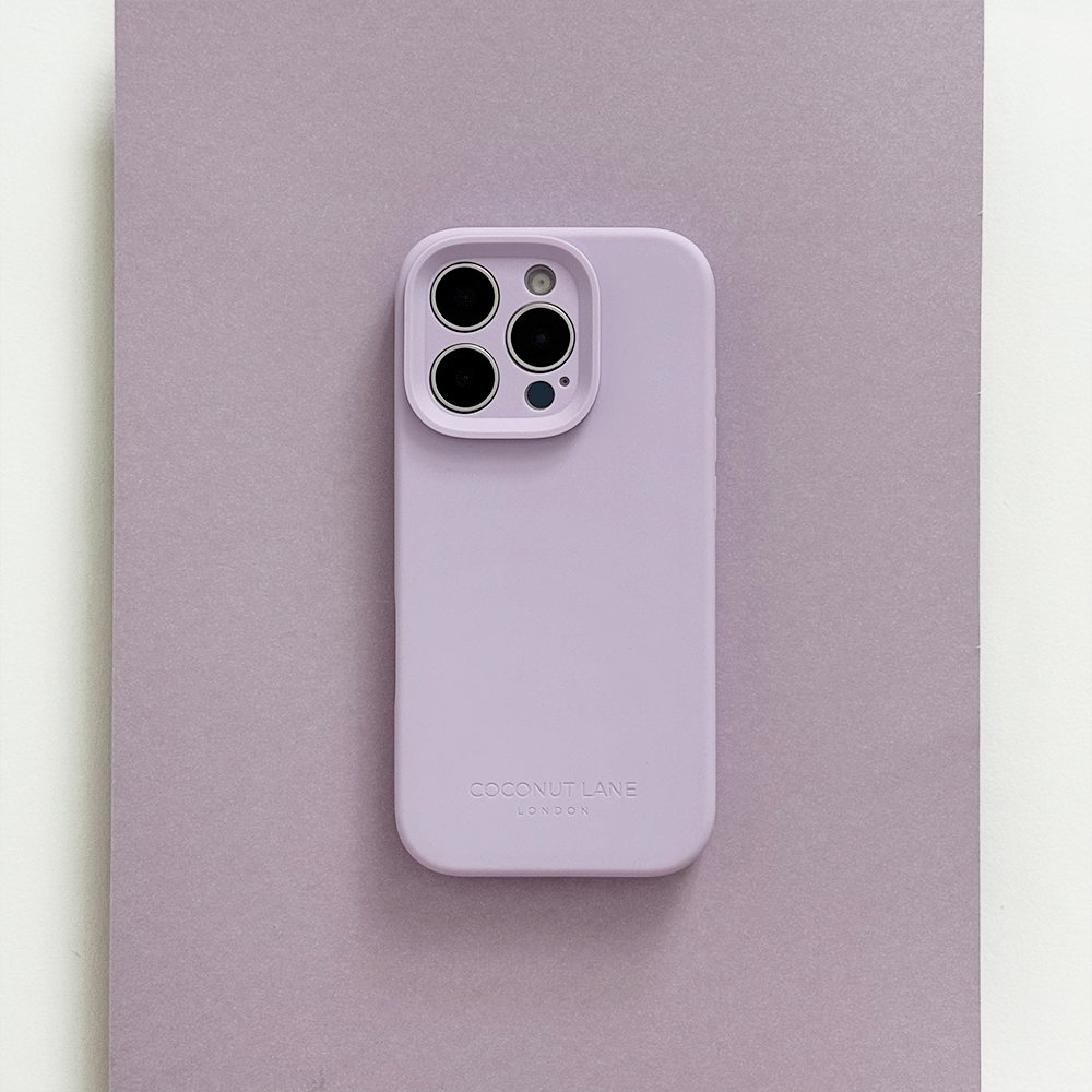 Lilac Phone Case with 'Coconut Lane' branding on a pink background.