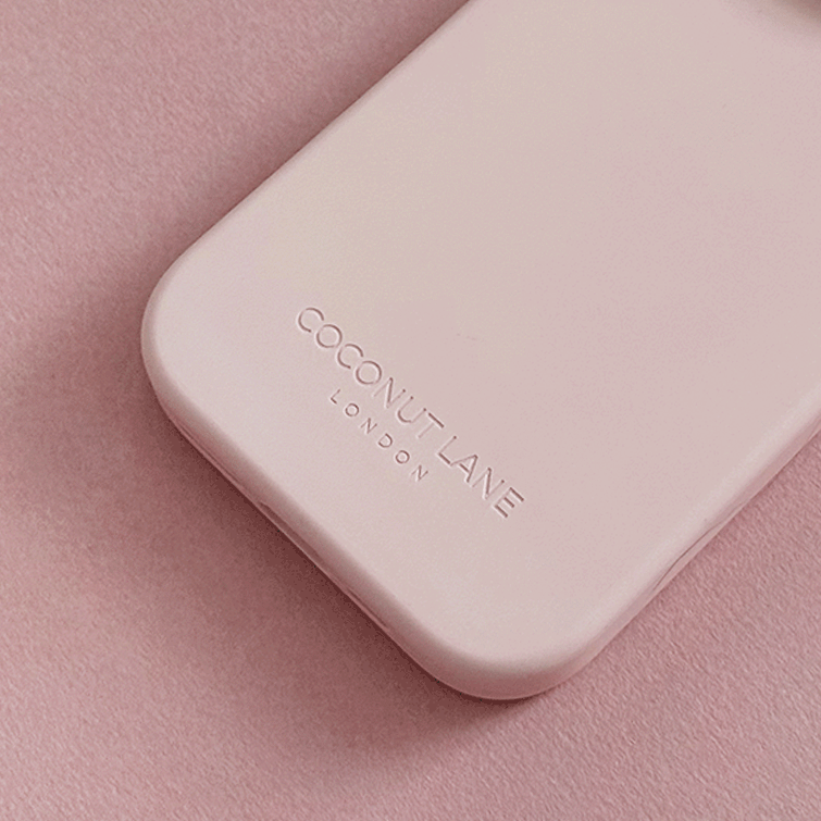 Pink Phone Case with 'Coconut Lane' branding on a pink background.