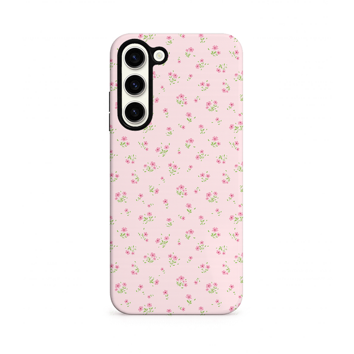 Phone case with a pink floral design on a white background