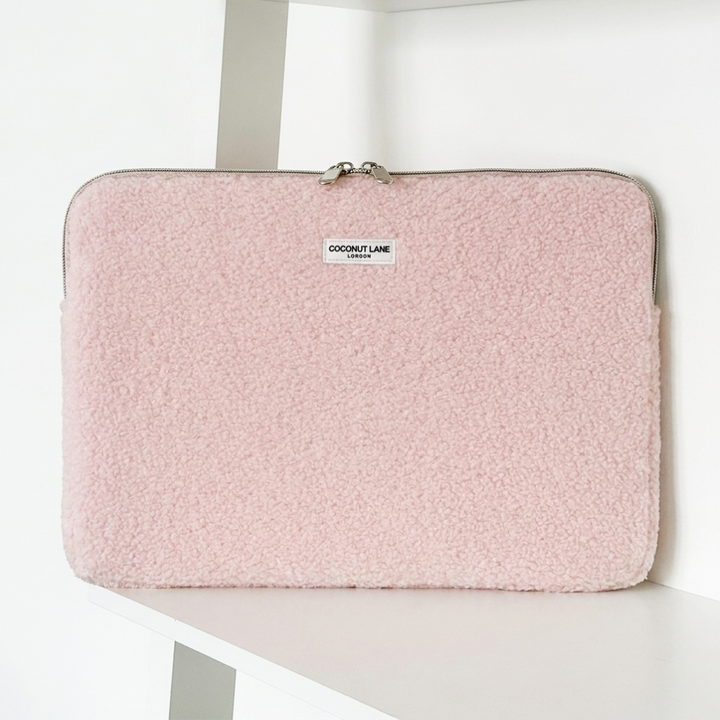 Teddy pink boucle textured Laptop Sleeve with zip closure and Coconut Lane logo. 
