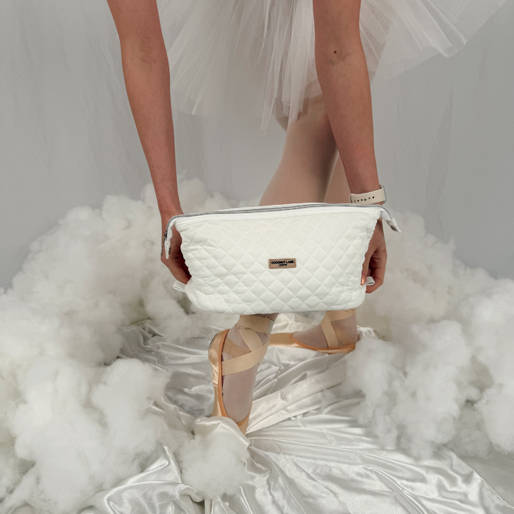 Girl holding the Milky Makeup Bag