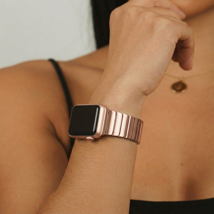 Girl wearing slinky rose gold watch strap