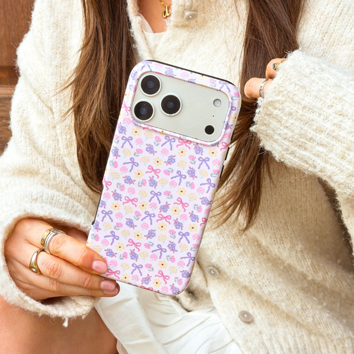 girl holding spring bows tough phone case close up image
